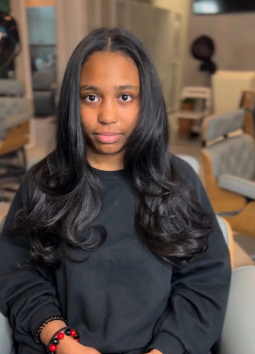Silk press on natural textured hair with smooth roots and polished ends at Healthy Hair Care First in Arlington, Texas.